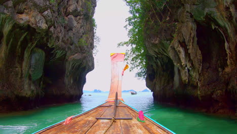 SLOW-MOTION-|-Long-Tail-Boat-going-though-narrow-passage-in-Thailand