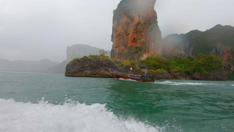 SLOW-MOTION-|-A-boat-in-a-rainstorm-in-Thailand-with-Islands-in-the-background
