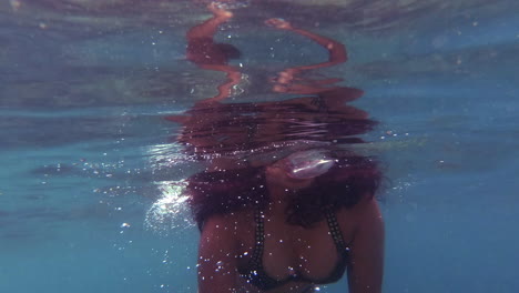 SLOW-MOTION-|-Indian-girl-going-snorkeling---swimming-looking-for-tropical-fish