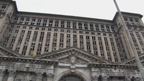 Pan-Shot-of-Smashed-Windows-and-Broken-Facade-of-Michigan-Central-Station-in-Detroit