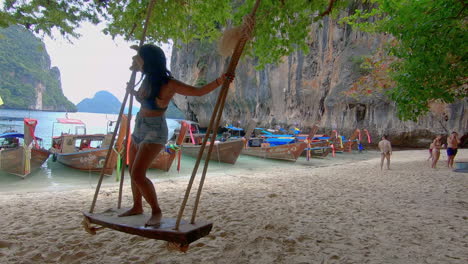 SLOW-MOTION-|-Smiling-Girl-in-Bikini-on-beach-swing-in-Thailand