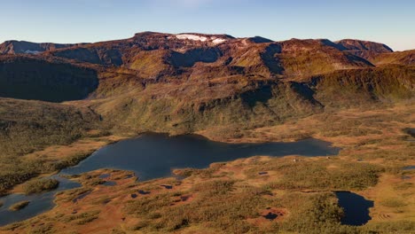 Bird's-eye-view-of-the-small-lake-on-the-plateau-on-Senja-island