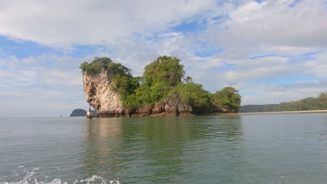SLOW-MOTION-|-Passing-by-a-small-island-off-the-coast-of-Thailand-from-a-boat