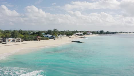 Beautiful-sandy-beach-on-the-coast-of-Grand-Turk-Island-in-the-Turks-and-Caicos-Archipelago