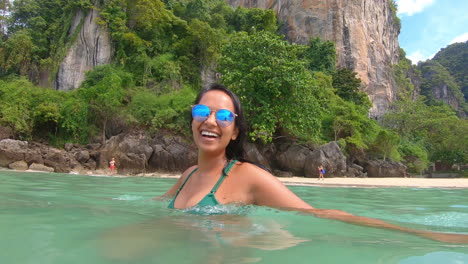 SLOW-MOTION-|-Beautiful-Indian-Girl-in-bikini-smiling-and-having-fun-swimming-in-the-tropical-water-in-Thailand