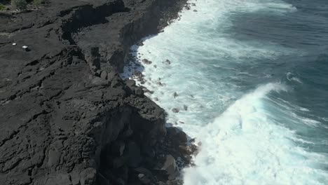 HD-120fps-aerial-gimbal-dawn-waves-against-lava-cliff