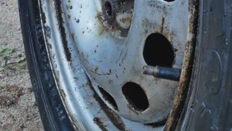Close-Up-Knife-Pierced-Car-Tire