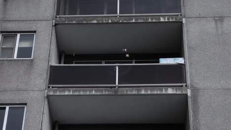 Tilt-down-shot-of-balconies-of-a-public-housing-block