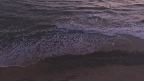 Sea-Waves-Rinse-Seaside-Beach-At-Sunset-1