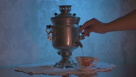 Pouring-Hot-Water-from-a-Soviet-Vintage-Samovar-Electric-Metal-Tea-Kettle-into-a-Gorgeous-Cup-3