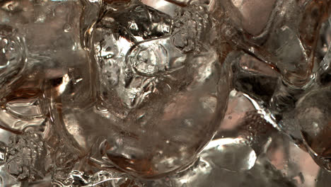 Cocktail-ingredients-on-ice-cubes-extreme-close-up