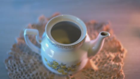 The-Man-Puts-Thyme-Tea-in-a-Teapot-and-Fills-With-Boiling-Water