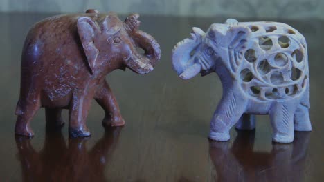 Close-Up-Of-Two-Souvenir-Elephants-On-The-Table-2