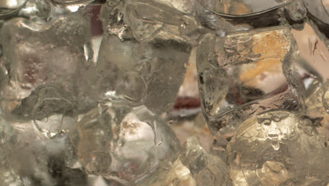 Cocktail-ingredients-on-ice-cubes-extreme-close-up-3