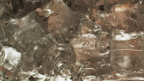 Cocktail-ingredients-on-ice-cubes-extreme-close-up-2
