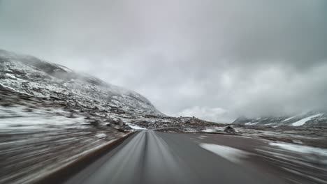 A-drive-on-the-Gamle-Strynfjellsvegen-towards-Stryn,-Norway