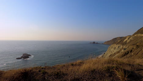 Northern-California-cliffs-along-the-oceanside-on-a-beautiful-summer-evening-4K