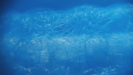Material-Azul-De-Mascarilla-Médica-De-Primer-Plano-Macro-Microscópico