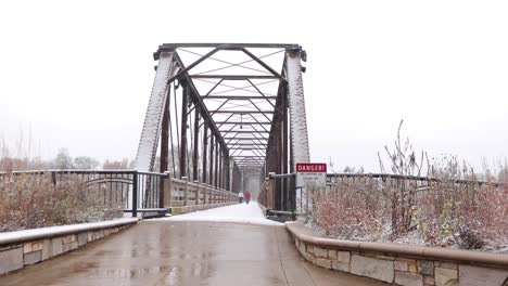 Snow-covered-bridge-during-fresh-snowfall-in-winters-1
