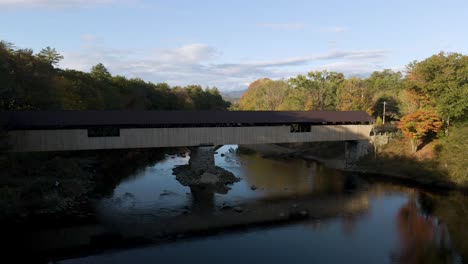 Traveling-Concept---Antique-Covered-Bridge-in-Beautiful-new-England-Nature-Landscape---Aerial-Establisher