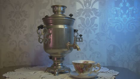 Vintage-Samovar-Metal-Tea-Kettle-Illuminated-by-Blue-and-Pink-Light
