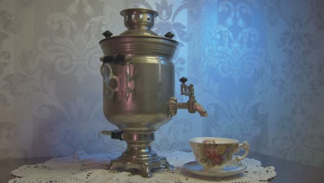 Vintage-Samovar-Metal-Tea-Kettle-Illuminated-by-Blue-and-Pink-Light-1