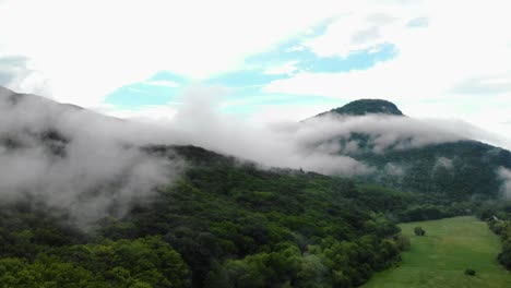 Misty-Forest-On-Dense-Hills-In-Bulgaria---drone-pullback