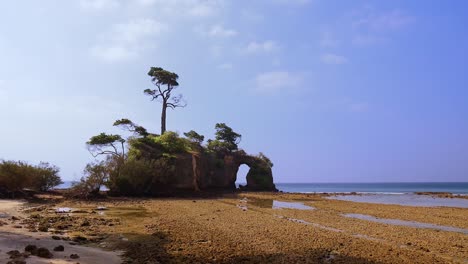 Lakshmanpur-beach-no-2-and-the-famous-natural-coral-bridge-during-lowtide-on-Neil-island,-Andaman-and-Nicobar-islands,-India