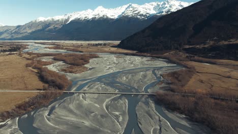 Drone-tilt-reveal-of-glacier-fed-rivers-in-New-Zealand-countryside