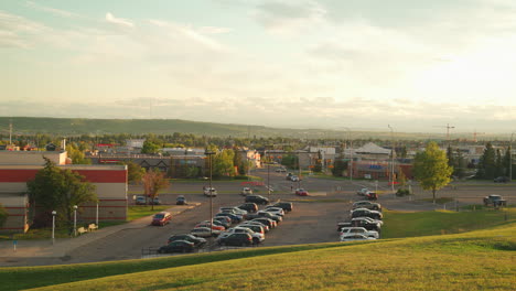 Overlook-of-parking-lot-at-a-community-centre-in-a-suburban-neibourhood-during-a-warm-golden-hour