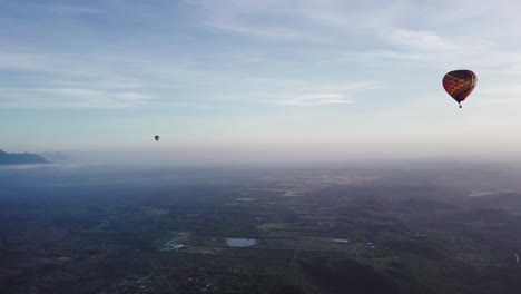 Hot-air-balloon,-Sierra-Madre-Mountains,-Montemorelos,-Mexico,-scenic-drone-shot