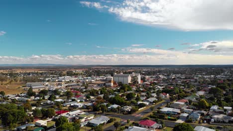 Aerial-drone-view-towards-the-tallest-structure-of-Kingaroy,-the-Peanut-Silo