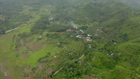 Aerial-drone-video-above-a-green-jungle-in-a-warm-tropical-foreign-country