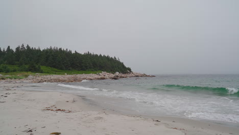 Overcast-day-at-an-east-coast-beach-in-Nova-Scotia,-Canada-during-the-fall-months-1