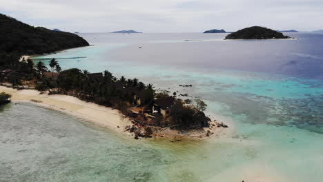 Aerial-view-of-tropical-beach-on-the-Bulog-Dos-Island,-Philippines-10