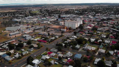 Aerial-view-over-the-town-of-Kingaroy,-sunny-evening,-in-Australia---Tracking,-drone-shot