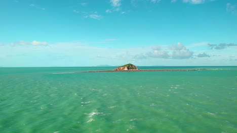 Aerial-drone-view-towards-the-Slade-Island-Reef,-warm-day,-in-Australia