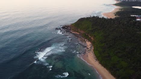 Drone-shot-in-morning-over-surf-reef-waves-in-Pacific-ocean-Forresters-Beach-NSW-Central-Coast-Australia-3840x2160-4K
