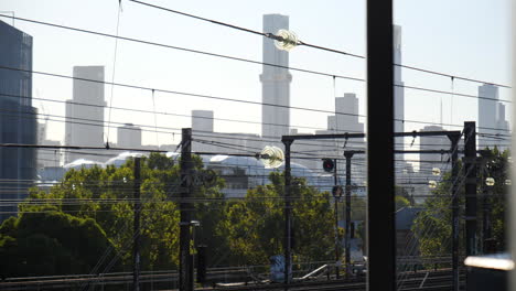 Melbourne-city-Eureka-Tower-through-train-lines