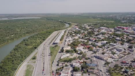 Aerial---International-Bridge-border-between-McAllen-and-Reynosa,-Mexico,-wide-shot