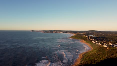 Drone-pan-shot-over-ocean-waves-at-Forresters-Beach-Wyrrabalong-National-Park-Central-Coast-NSW-Australia-3840x2160-4K