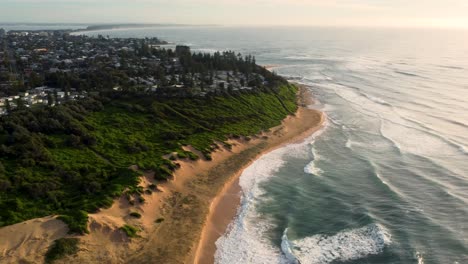 Ocean-coast-line-view-with-drone-pan-shot-over-coastal-town-Shelly-beach-ocean-surf-waves-at-Central-Coast-NSW-Australia-3840x2160-4K