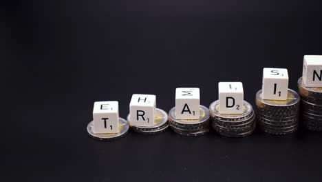 Close-Up-Of-Labeled-Dices-Spelling-The-Word-Trading