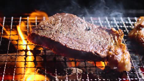 Sirloin-grilled-steak-cooking-on-fire-4K