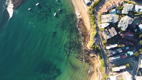 Drone-Bird's-eye-view-aerial-shot-of-The-Haven-and-the-Skillion-with-Terrigal-main-road-Central-Coast-NSW-Australia-3840x2160-4K