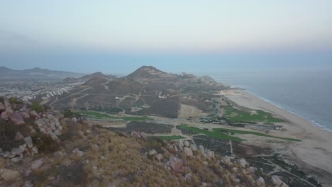 Aerial-reveal-of-Cabo-San-Lucas-beach,-Baja-California-Peninsula,-Mexico