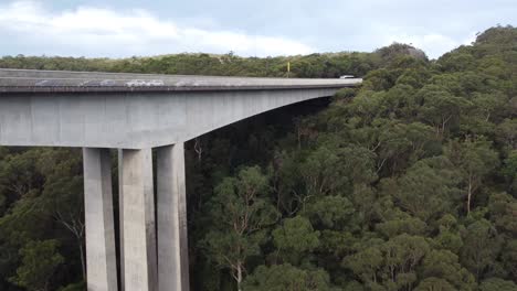 Drone-aerial-pan-shot-of-Mooney-Mooney-Creek-River-concrete-Bridge-with-cars-in-Somersby-Kariong-Brisbane-Water-National-Park-Bushland-Central-Coast-NSW-Australia-Sydney-Australia-3840x2160-4K