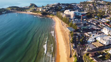 Drone-sky-aerial-shot-of-landscape-scenery-Terrigal-town-suburbs-and-the-beach-of-Central-Coast-Pacific-Ocean-NSW-Australia-3840x2160-4K