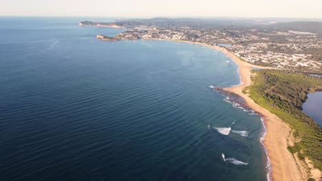 Drone-aerial-landscape-shot-of-coastline-ocean-beaches-Spoon-Bay-Wamberal-Point-and-Terrigal-NSW-Australia-3840x2160-4K
