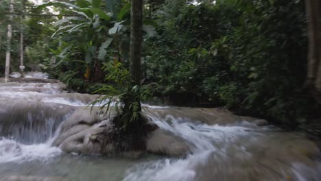 Tufa-terraces-od-Dunn's-River-Falls,-Jamaica,-famous-travel-destination